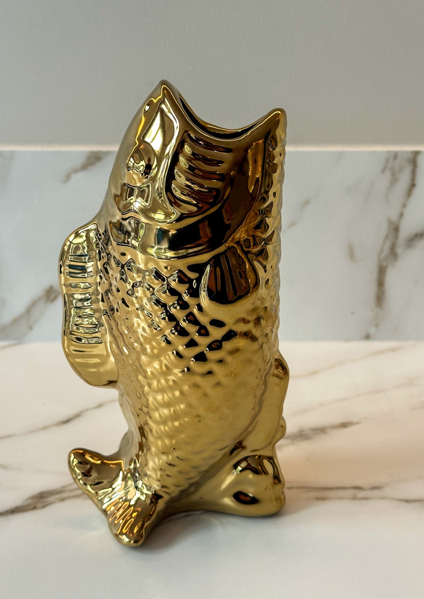 vaas vis goud