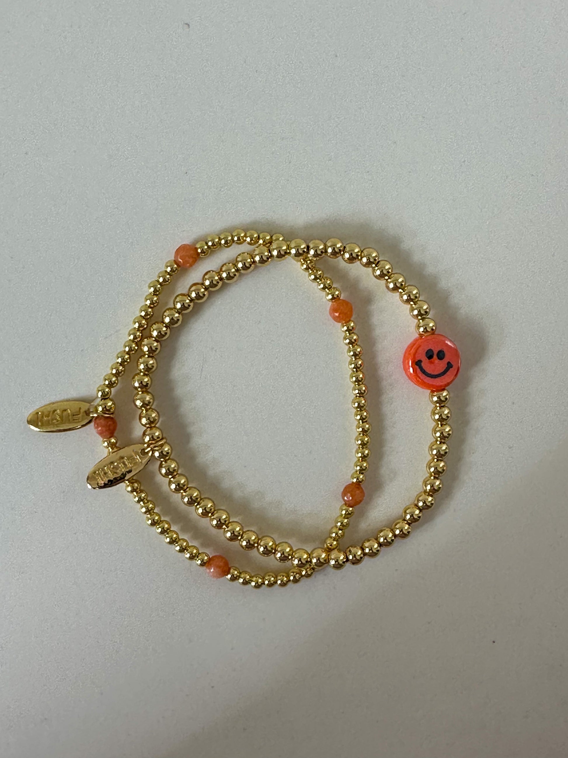 Armband goud smiley oranje - RUBY Conceptstore 